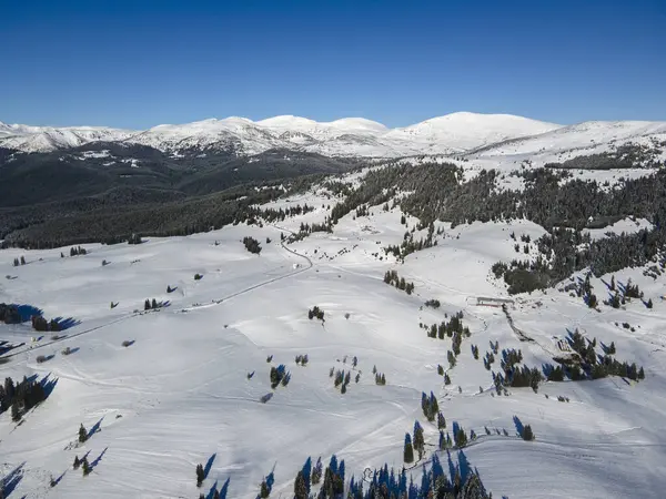 Amazing Aerial winter view of Rila mountain near Belmeken Dam, Bulgaria