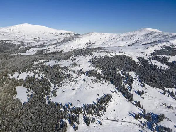 Amazing Aerial winter view of Rila mountain near Belmeken Dam, Bulgaria