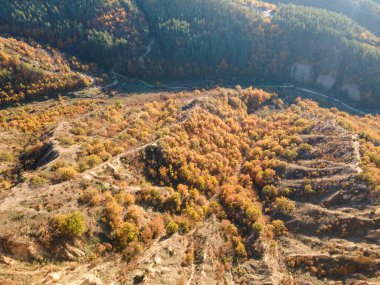 Aerial Autumn Sunset view of rock formation Stob pyramids, Kyustendil region, Bulgaria clipart