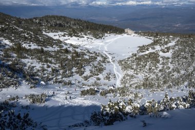 Amazing Winter view of Pirin Mountain near Polezhan and Bezbog Peaks, Bulgaria clipart