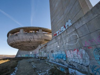 BUZLUDZHA, BULGARIA - NOVEMBER 19, 2024: Ruins of Abandoned Memorial House of Bulgarian Communist Party at Buzludzha Peak, Stara Zagora region, Bulgaria clipart