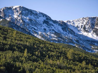 Amazing Autumn landscape of Rila Mountain near Mechit and Popova Kapa peaks, Bulgaria clipart