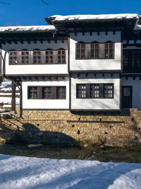 ETAR, GABROVO, BULGARIA - JANUARY 2, 2025: Winter view of Ethnographic village Etar (Etara) near town of Gabrovo, Bulgaria clipart