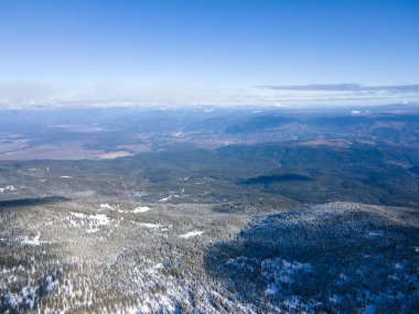 Amazing Aerial Winter view of Pirin Mountain near Polezhan and Bezbog Peaks, Bulgaria clipart