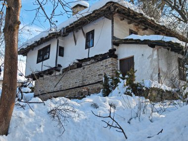 Amazing Winter panorama of village of Bozhentsi, Gabrovo region, Bulgaria clipart