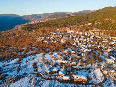 Aerial Winter view of Village of Leshten with Authentic nineteenth century houses, Blagoevgrad Region, Bulgaria clipart