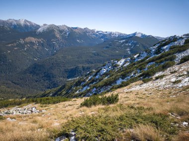 Amazing Autumn landscape of Rila Mountain near Mechit and Popova Kapa peaks, Bulgaria clipart