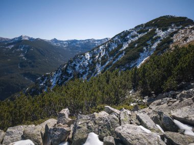 Amazing Autumn landscape of Rila Mountain near Mechit and Popova Kapa peaks, Bulgaria clipart