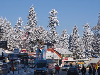 BOROVETS, BULGARIA - FEBRUARY 20, 2025: Winter view of ski resort of Borovets at Rila Mountain, Sofia Region, Bulgaria clipart