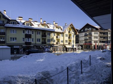 BOROVETS, BULGARIA - FEBRUARY 20, 2025: Winter view of ski resort of Borovets at Rila Mountain, Sofia Region, Bulgaria clipart