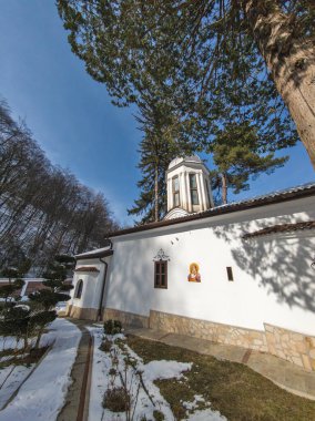 Orthodox Divotino Monastery dedicated to Holy Trinity at Lyulin Mountain, Sofia City Region, Bulgaria clipart