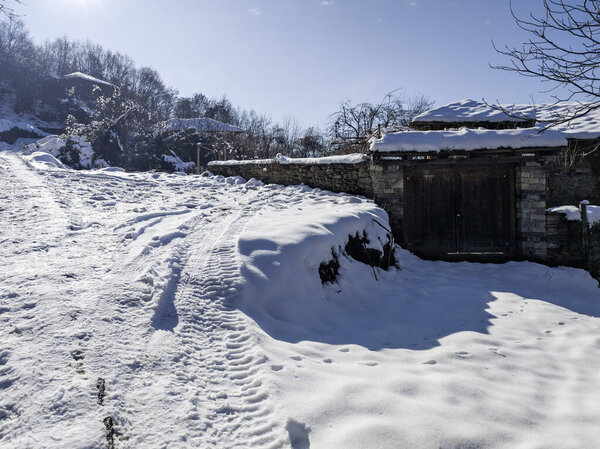 Winter view of Village of Leshten with Authentic nineteenth century houses, Blagoevgrad Region, Bulgaria