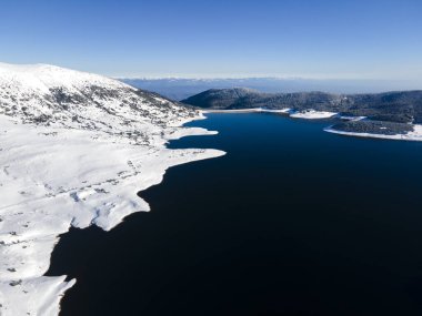 Amazing Aerial winter view of Rila mountain near Belmeken Dam, Bulgaria