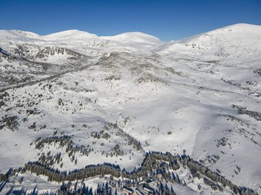 Amazing Aerial winter view of Rila mountain near Belmeken Dam, Bulgaria