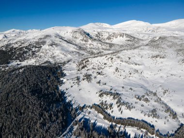 Amazing Aerial winter view of Rila mountain near Belmeken Dam, Bulgaria