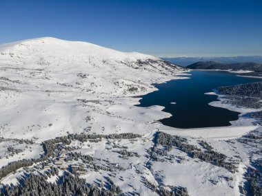 Amazing Aerial winter view of Rila mountain near Belmeken Dam, Bulgaria
