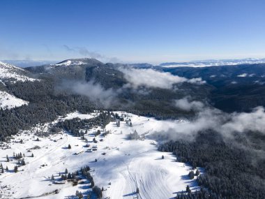 Amazing Aerial winter view of Rila mountain near Belmeken Dam, Bulgaria