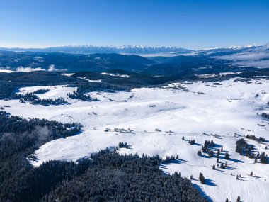 Amazing Aerial winter view of Rila mountain near Belmeken Dam, Bulgaria