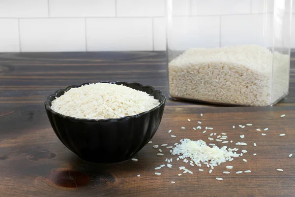 Raw Long Grain White Rice Black Bowl Wooden Table Stock Picture