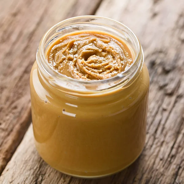 Creamy Smooth Peanut Butter Jar Photographed Wood Selective Focus Focus — Stock Photo, Image