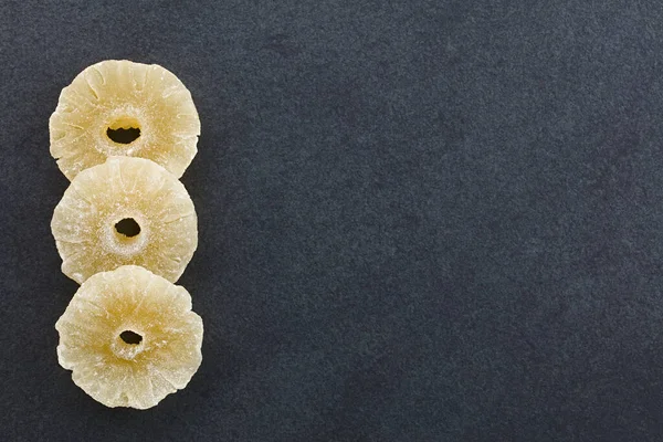 Dried Candied Pineapple Slices Photographed Overhead Slate Copy Space Side — Stock Photo, Image