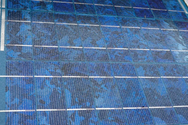 The texture of the solar battery. Fragment of a section of solar battery cells close-up.