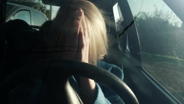 Tired Woman Driving Car Child Background Woman Her Hands Folded — Stock Video