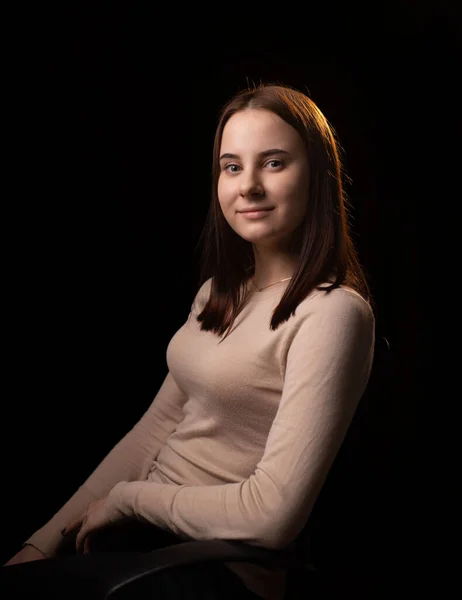 Young Positive Woman Looks Camera Dark Background Friendly Face Looks — Fotografia de Stock