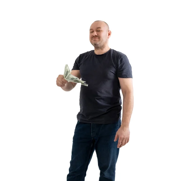 Hombre Satisfecho Jeans Una Camiseta Orgullosamente Tiene Dólares Aislado Sobre — Foto de Stock