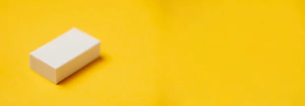Eraser on a yellow background. Banner, place for text.