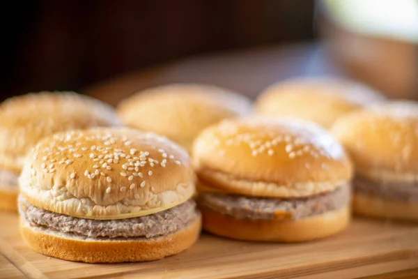 Semi Finished Cheeseburger Frozen Hamburgers Wooden Background — Stock Photo, Image