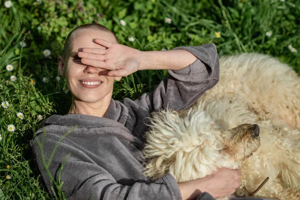 Joyful Contented Bald Woman Dog Lying Green Grass Sunny Day — Stock Photo, Image