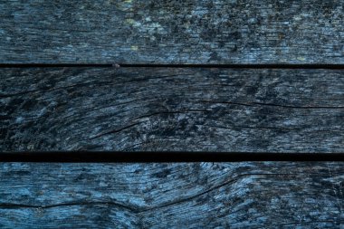 Eskimiş ahşap yüzey koyu mavi desenli ve tahıl desenli..