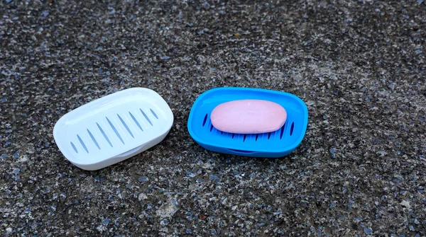 used soap in plastic dish ,health and personal hygiene concept.