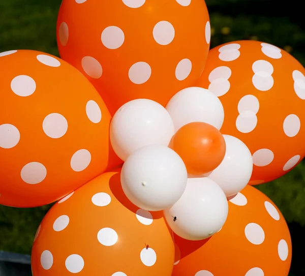 Balloon party background. Colorful balloons in orange and white , colors. Children birthday party balloon background
