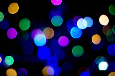 Güzel bir gece ışığı, soyut bulanık bulanık arka plan. Renkli süsleme ışıkları tasarım için. Kutlama, Noel veya festival mevsimsel arka plan kavramını parlatmaktadır