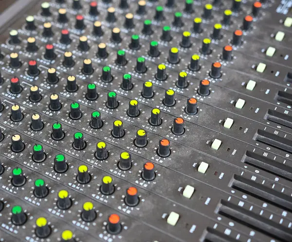stock image A professional sound mixer with many adjustments and knob switches