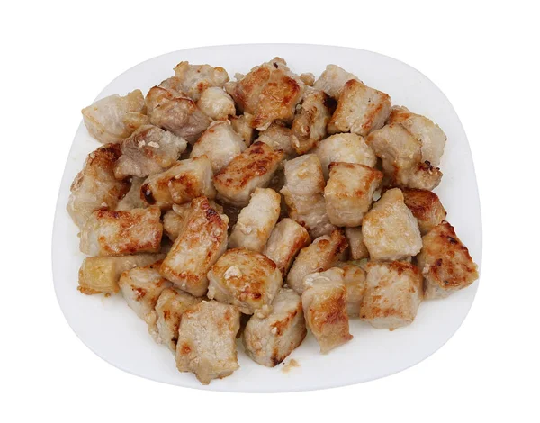 stock image Pieces of pork neck fried for stew . Isolated on white