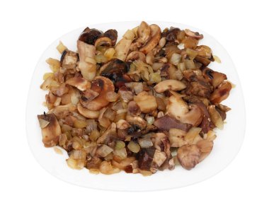 Buzları çözülmüş porcini mantarları ve soğanlı jülyen için beyaz üzerine izole edilmiş.