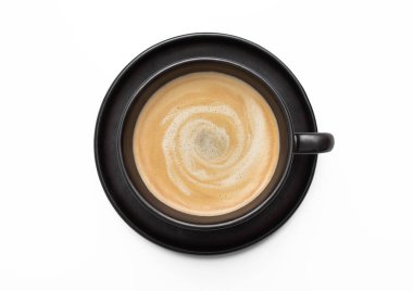 Large black creamy coffee in porcelain cup with saucer on white. Top view.