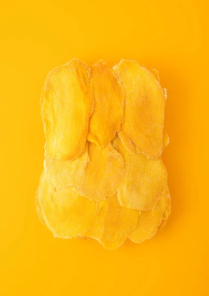 Large Dried Sweet Mango Slices Yellow Background — Stock Photo, Image