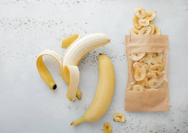 Fresh Raw Healthy Bananas Package Dried Banana Chips Light Board — Stock Photo, Image
