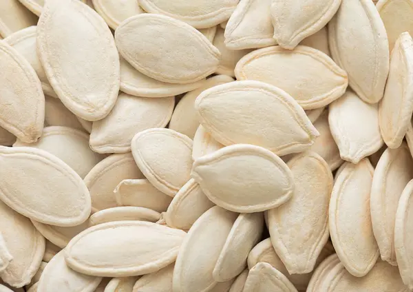 Raw White Salted Pumpkin Seeds Top View Macro Background Stock Photo