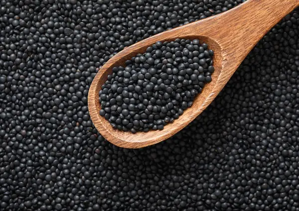 Wooden Spoon Black Organic Healthy Lentils Grain Seed Stock Image