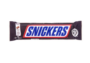 LONDON, UK - NOVEMBER 01, 2024: Original Snickers bar with caramel and peanuts on white background. clipart