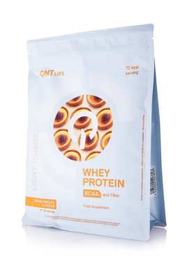 LONDON, UK - 15 Mart 2025: QNT creme brulee light digest whey protein with bcaa and fiber on white.