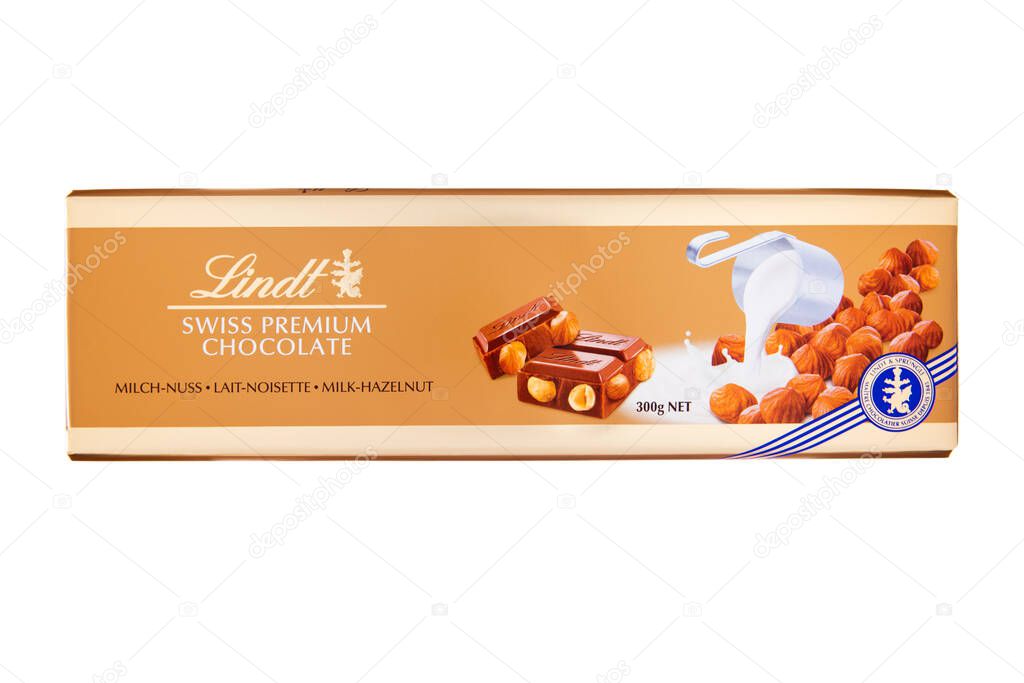 LONDON, UK - DECEMBER 25, 2024: large Lindt swiss premium chocolate bar with hazelnuts on white.