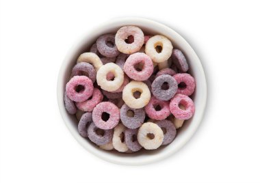 Çeşitli meyve çemberleri ve vitaminlerle bembeyaz mısır gevreği..