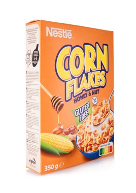 LONDON, İngiltere - Nisan 29,2025: Beyaz arkaplanda ballı bir kutu glütensiz mısır gevreği.