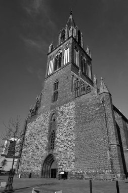 Tower of the medieval St.-Marien-Kirche Evangelical Church in the city of Neubrandenburg, Germany, monochrome